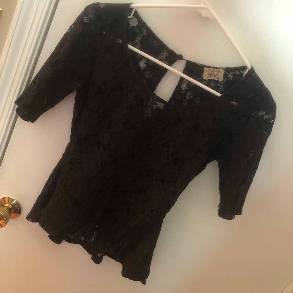 black lace peplum style top. Size S